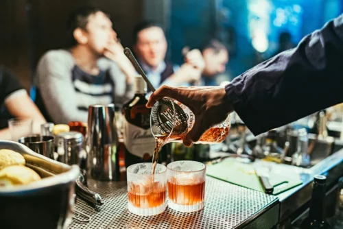 Bartender making a Manhattan cocktail