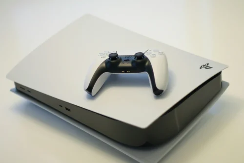 Picture of a PS5 console and controller