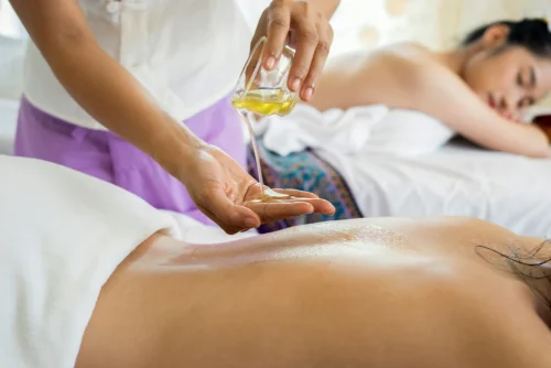 Women getting massages at a spa