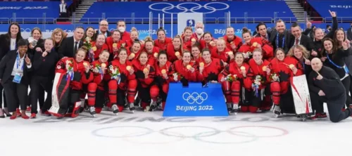 Poulin and Stacey with team Canada at the 2022 Olympics