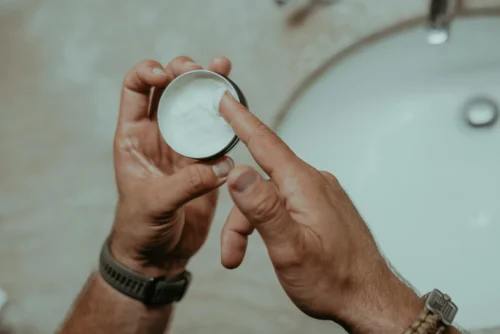 Person applying hand cream