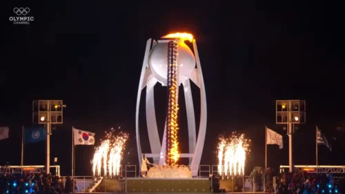 Figure skater Yuna Kim lighting the Olympic flame
